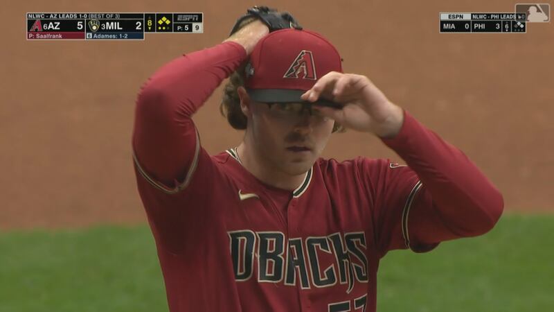 Arizona's Andrew Saalfrank pitches against the Brewers in the Wild Card round.