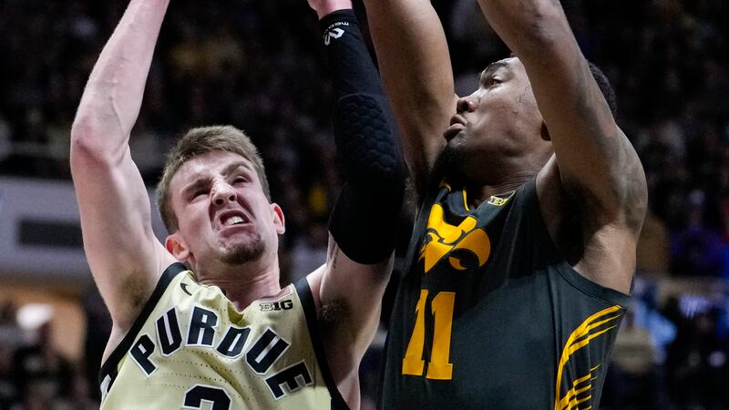 Purdue guard Braden Smith (3) shoots over Iowa guard Tony Perkins (11) during the second half...