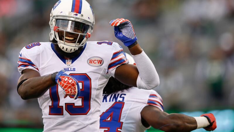 FILE - Buffalo Bills wide receiver Mike Williams (19) celebrates with teammate Sammy Watkins...