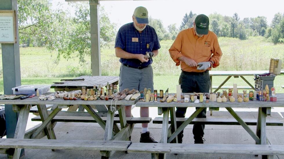 Tim and Jeff Ormiston carve wood spirits at Matea County Park