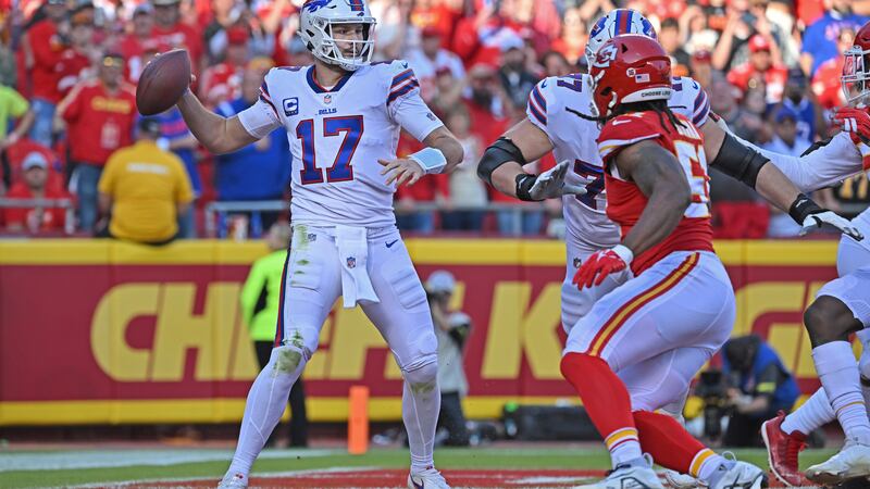Buffalo Bills quarterback Josh Allen (17) throws a pass during an NFL football game against...