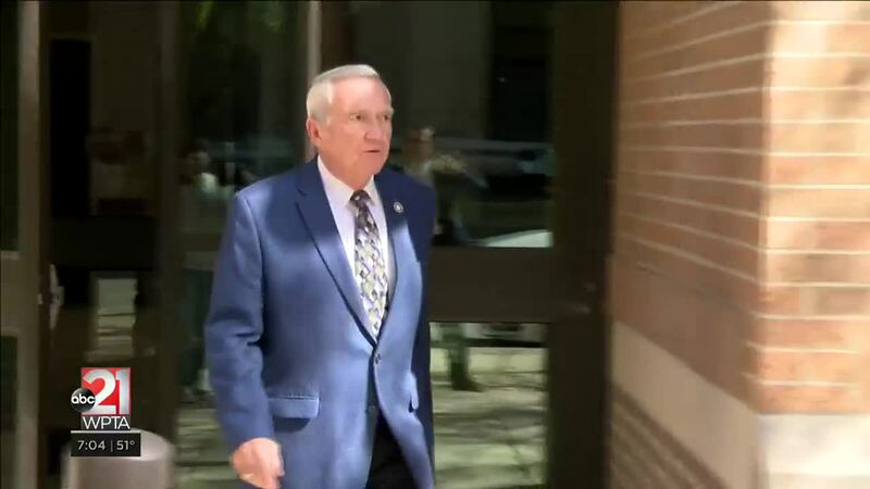 FILE PHOTO - Mayor Tom Henry leaving a court hearing after pleading guilty to OWI.